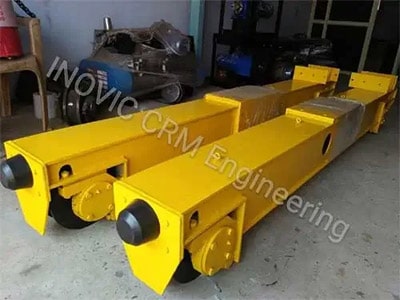 Inverter driven end carriages for overhead cranes.